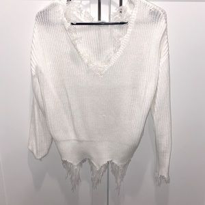 White off the shoulder cropped raw hem sweater